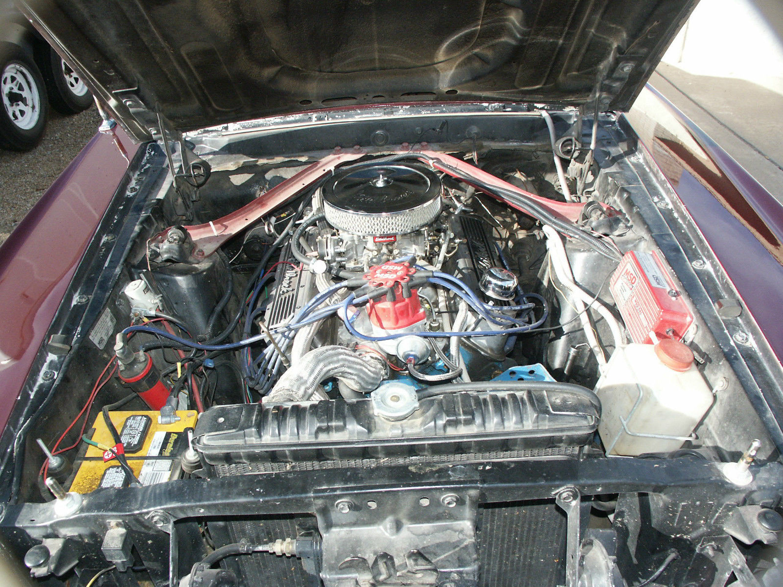 1969 Burgundy Ford Mustang Coupe