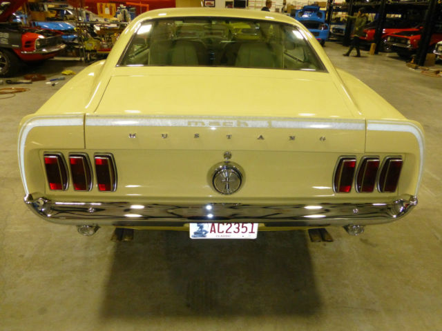 1969 meadowlark yellow Ford Mustang sportsroof