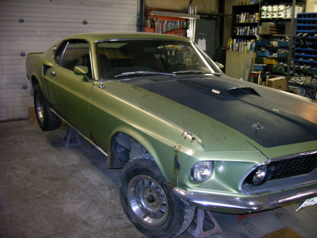 1969 code 15-Lime Gold with Matte black hood Ford Mustang Fastback