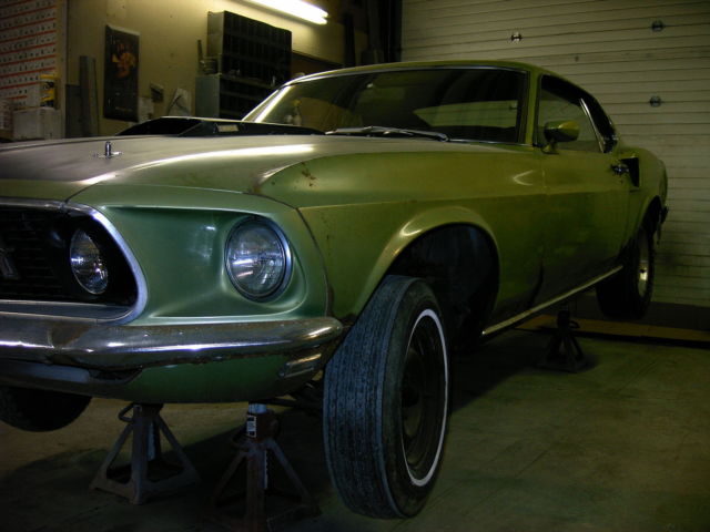 1969 code 15-Lime Gold with Matte black hood Ford Mustang Fastback