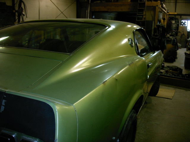 1969 code 15-Lime Gold with Matte black hood Ford Mustang Fastback