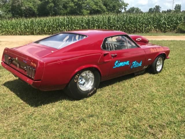 1969 Burgundy Ford Mustang Fastback