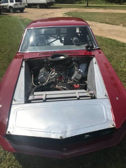 1969 Burgundy Ford Mustang Fastback