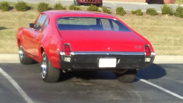 1969 Red Oldsmobile 442 Sedan