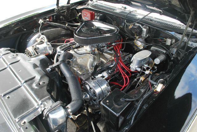 1969 Black with gold Oldsmobile 442 Coupe