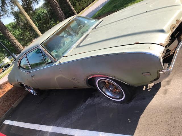 1969 Green Oldsmobile Cutlass Coupe