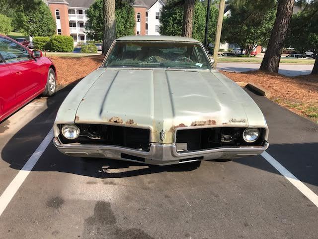 1969 Green Oldsmobile Cutlass Coupe