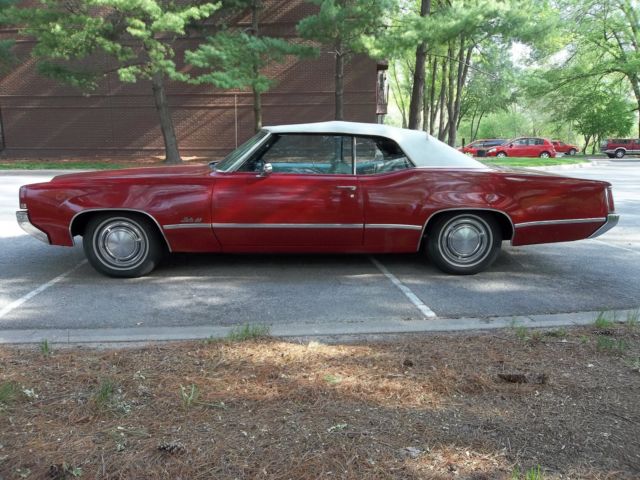 1969 Red Oldsmobile Eighty-Eight Convertible