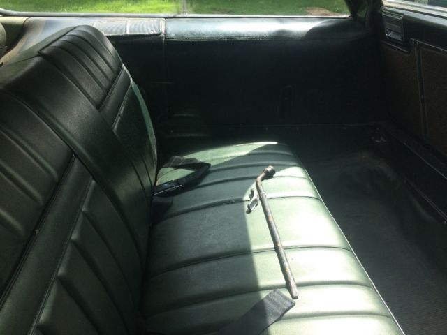 1969 Woody (Fake) and Dark green Pontiac Safari Wagon