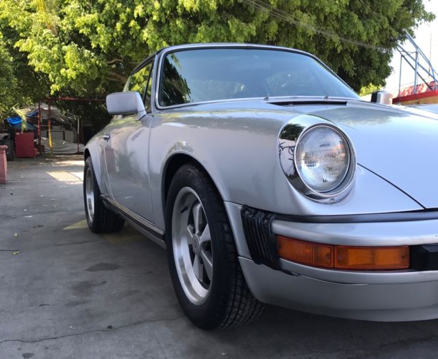 1969 Silver Porsche 911 Coupe convertable
