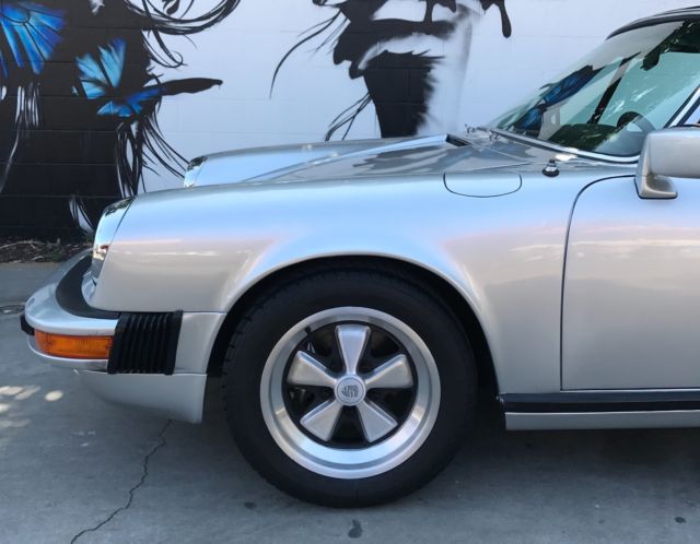 1969 Silver Porsche 911 Coupe convertable