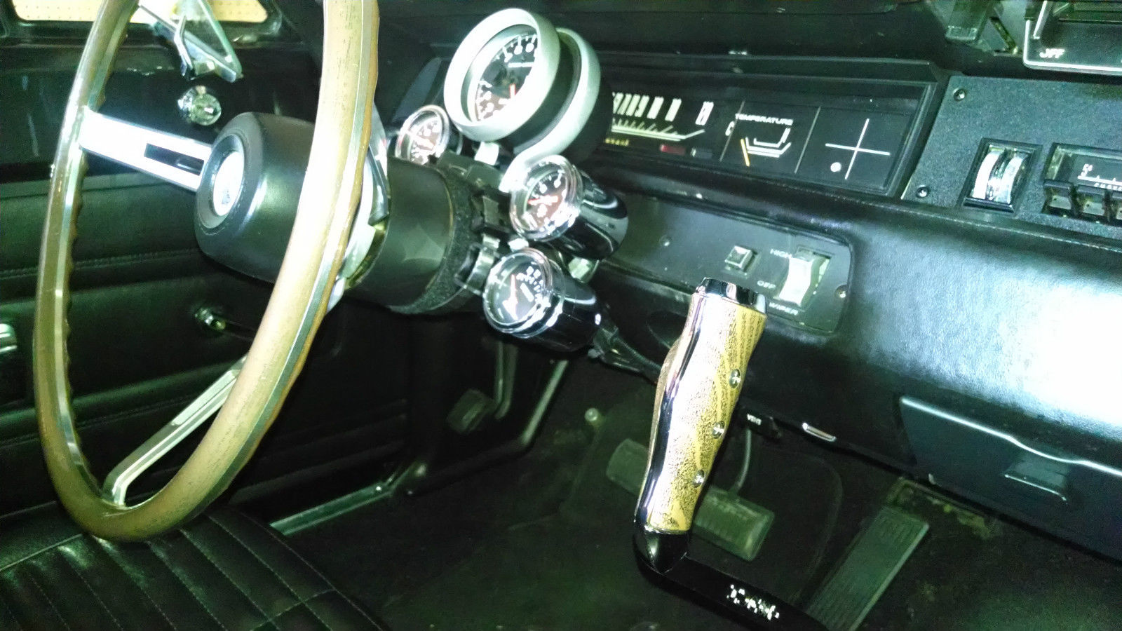 1969 Black and Gray Plymouth Road Runner post