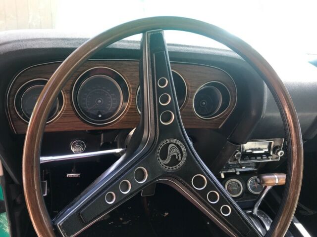 1969 Grabber green Ford Mustang Fastback