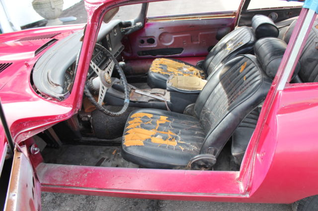 1969 Burgundy Jaguar E-Type Coupe