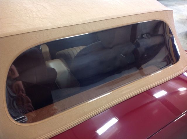 1969 Opalescence Maroon Jaguar E-Type Convertible