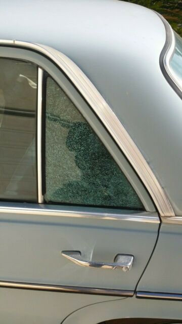 1970 Blue Mercedes-Benz 200-Series Sedan