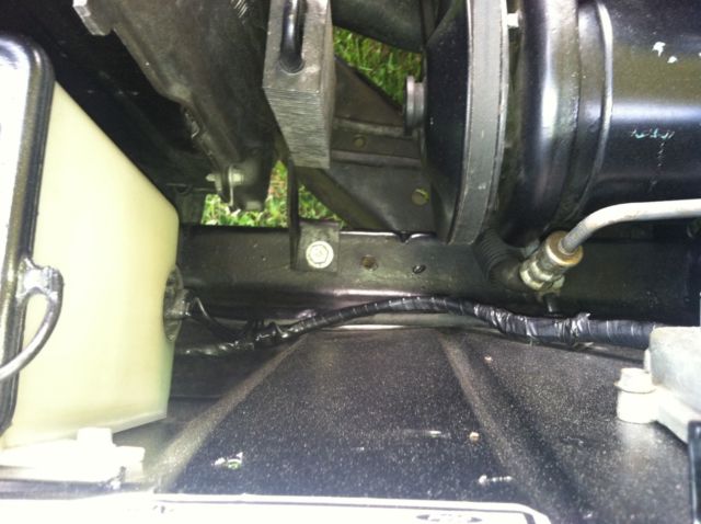 1970 yellow and black Ford Mustang Coupe