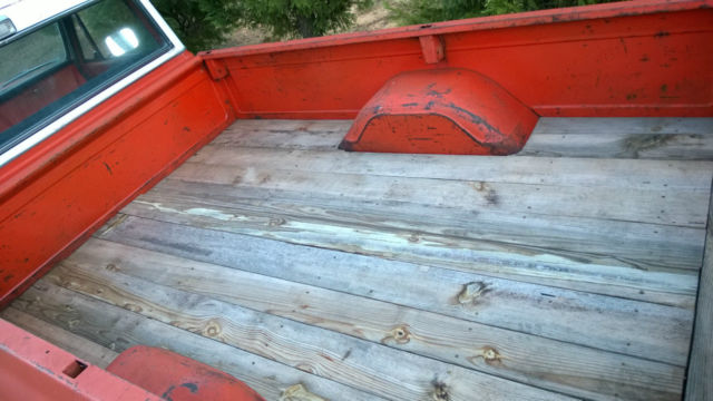 1970 orange/white Chevrolet C-10 Standard Cab Pickup