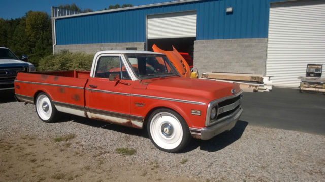 1970 orange/white Chevrolet C-10 Standard Cab Pickup