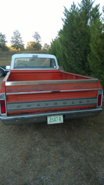 1970 orange/white Chevrolet C-10 Standard Cab Pickup