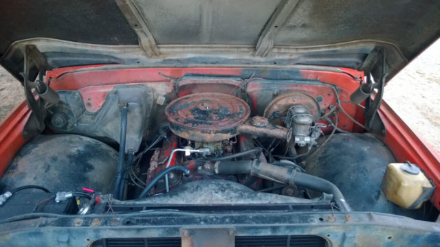 1970 orange/white Chevrolet C-10 Standard Cab Pickup