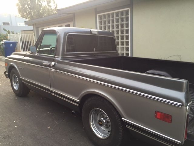 1970 metalic silver and grey Chevrolet C-10 Standard Cab Pickup
