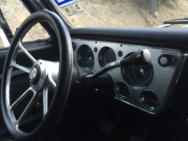 1970 metalic silver and grey Chevrolet C-10 Standard Cab Pickup