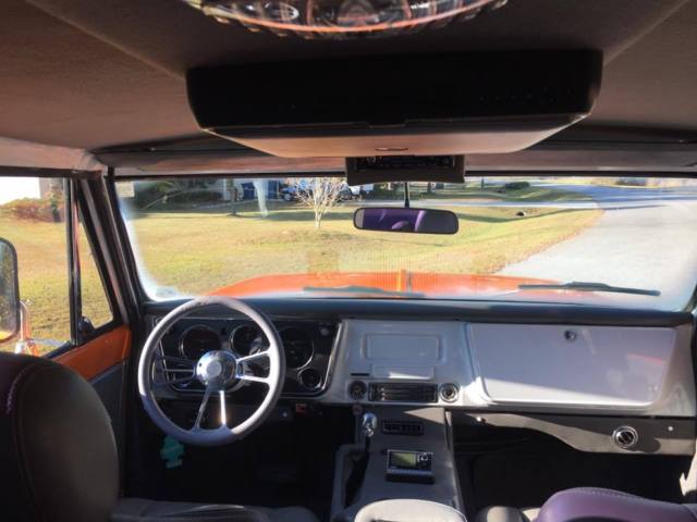 1970 Orange Chevrolet Suburban SUV