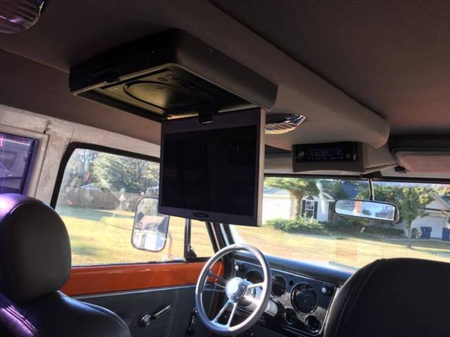 1970 Orange Chevrolet Suburban SUV