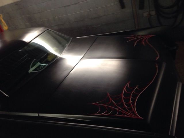 1970 Satin Black Cadillac DeVille Coupe