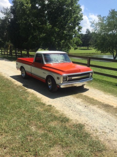 1970 Orange/white Chevrolet C-10 Pickup