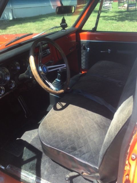 1970 Orange/white Chevrolet C-10 Pickup