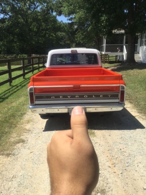 1970 Orange/white Chevrolet C-10 Pickup
