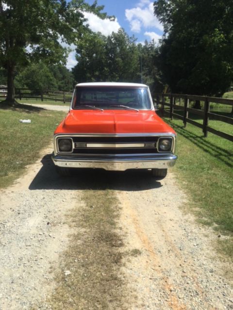 1970 Orange/white Chevrolet C-10 Pickup