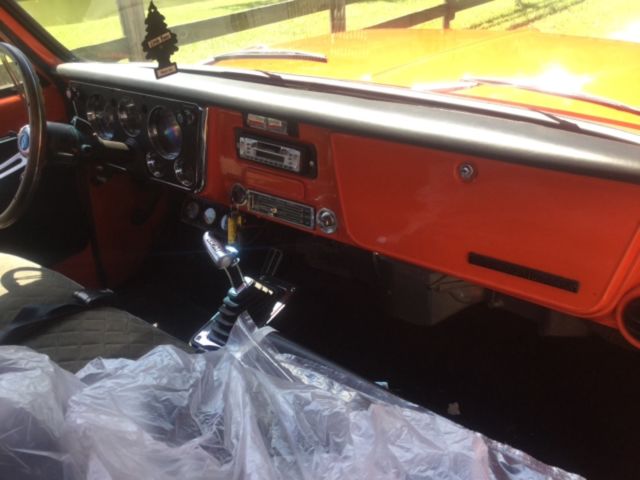 1970 Orange/white Chevrolet C-10 Pickup