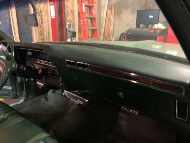 1970 Green Chevrolet Impala Coupe