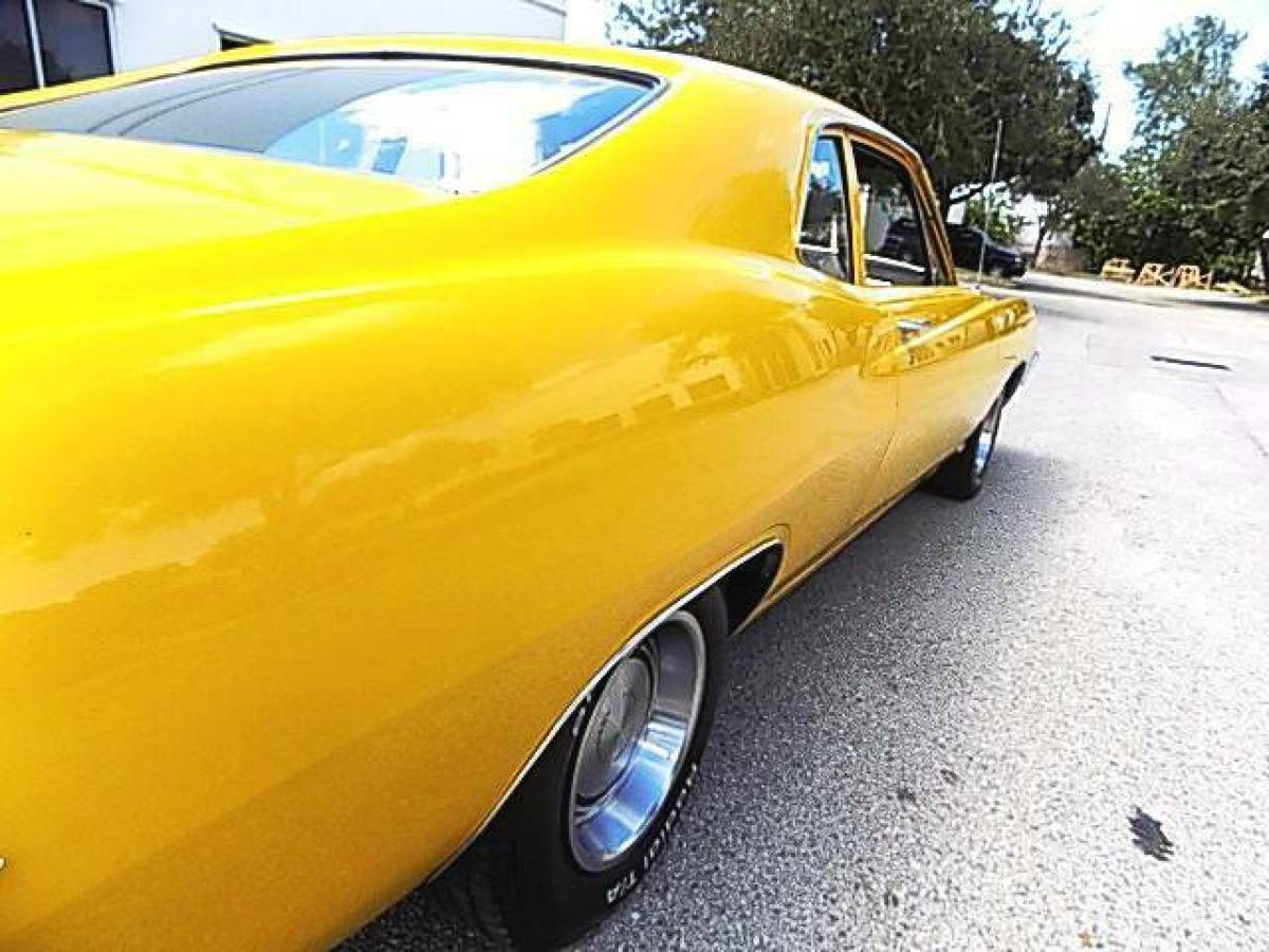 1970 Yellow Ford Falcon Coupe