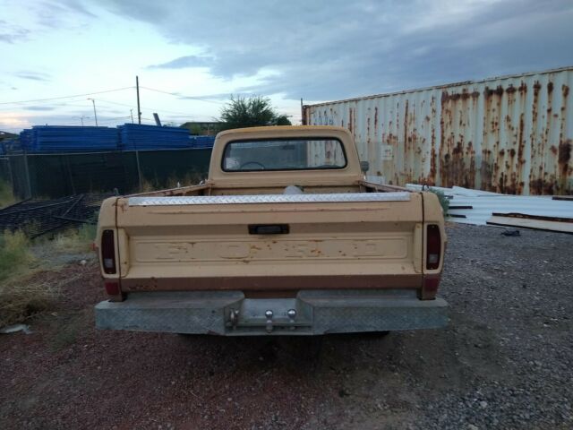 1970 Tan Ford F-100 pickup