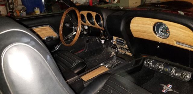 1970 Burgundy Ford Mustang Fastback