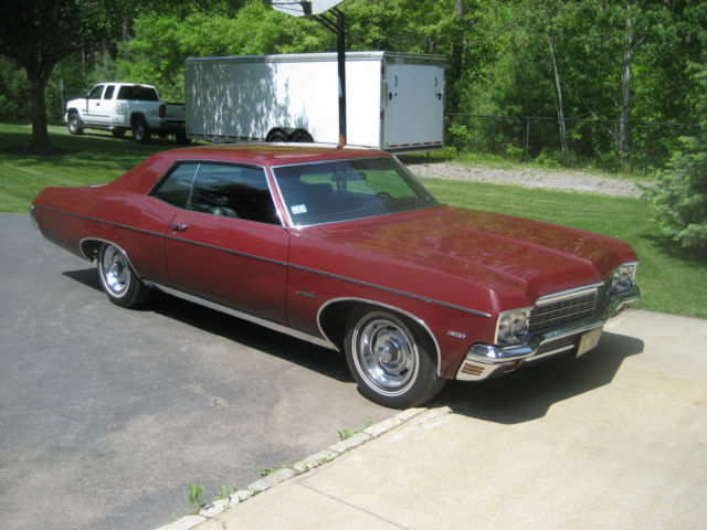 1970 black cherry Chevrolet Impala Coupe