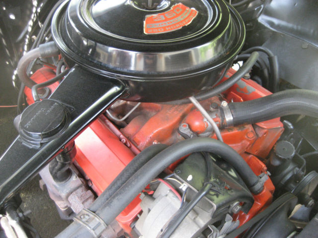 1970 black cherry Chevrolet Impala Coupe