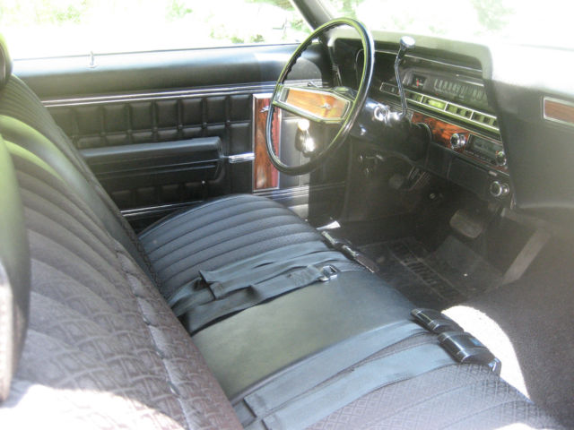 1970 black cherry Chevrolet Impala Coupe