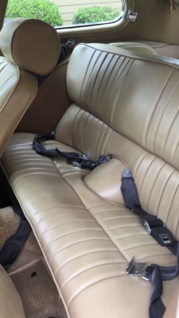 1970 Burgundy Jaguar E-Type Coupe