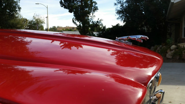 1970 Red Jaguar XJ6 Sedan