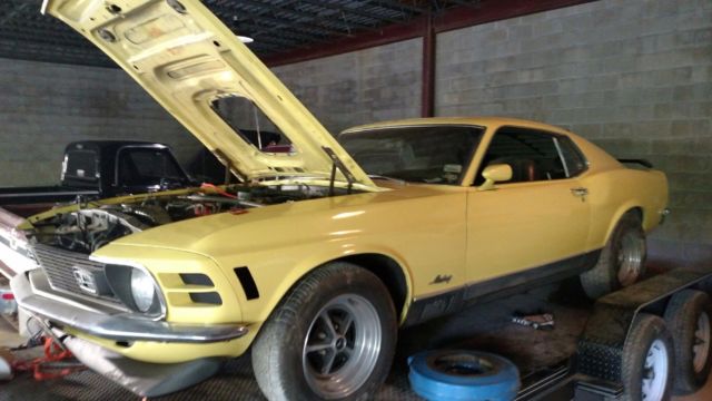 1970 Burgundy metalic. With bottle of pearl Ford Mustang Fastback