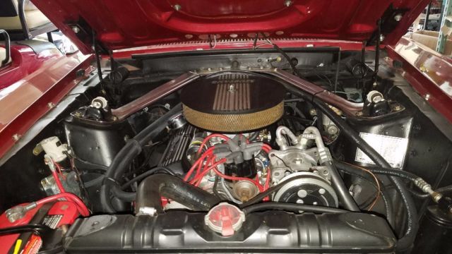 1970 Burgundy metalic. With bottle of pearl Ford Mustang Fastback