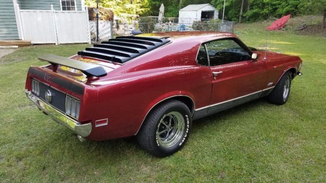 1970 Burgundy metalic. With bottle of pearl Ford Mustang Fastback
