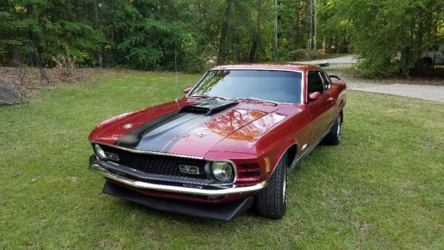 1970 Burgundy metalic. With bottle of pearl Ford Mustang Fastback