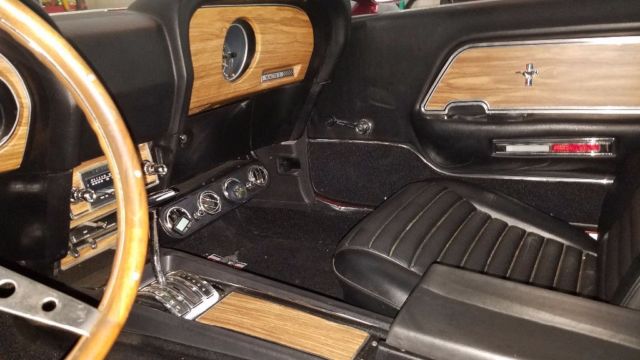 1970 Burgundy metalic. With bottle of pearl Ford Mustang Fastback
