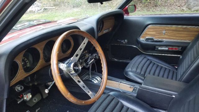 1970 Burgundy metalic. With bottle of pearl Ford Mustang Fastback
